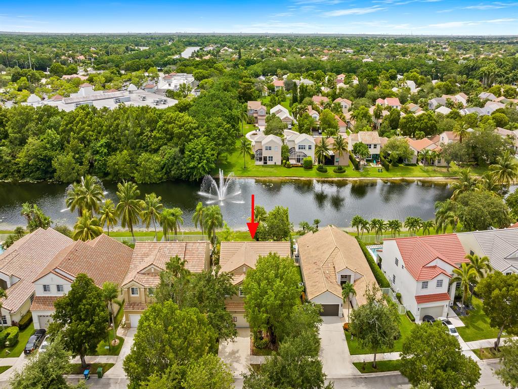301 Cameron Drive Weston, FL 33326 - Photo 5 of 39 an aerial view of residential houses with outdoor space and swimming pool