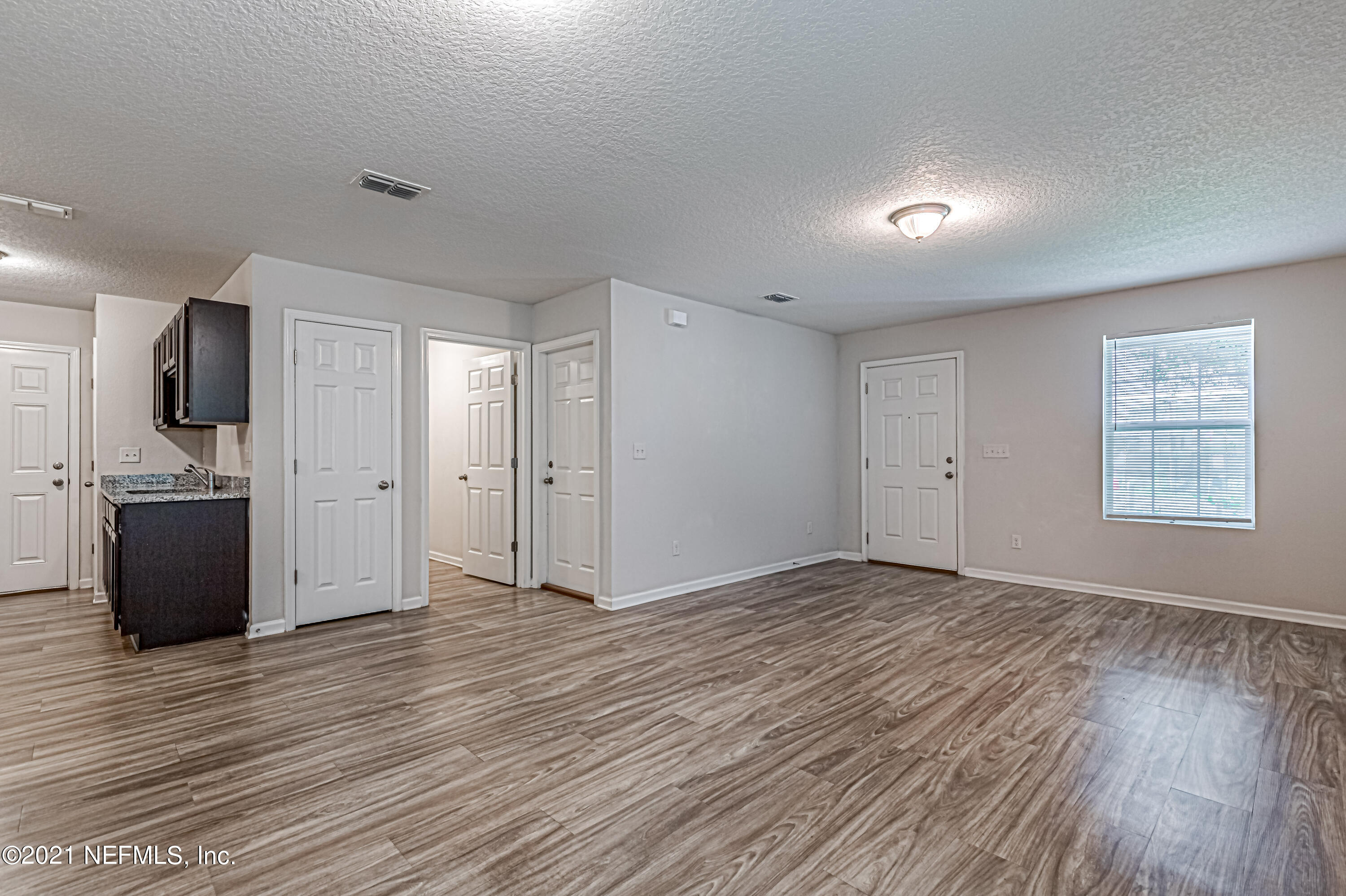 8117 Firetower Road Jacksonville, FL 32210 - Photo 7 of 24 7-Living Room