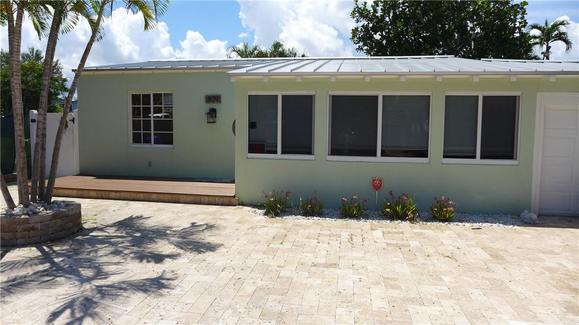 809 North Victoria Park Road Fort Lauderdale, FL 33304 - Photo 1 of 25 a front view of a house