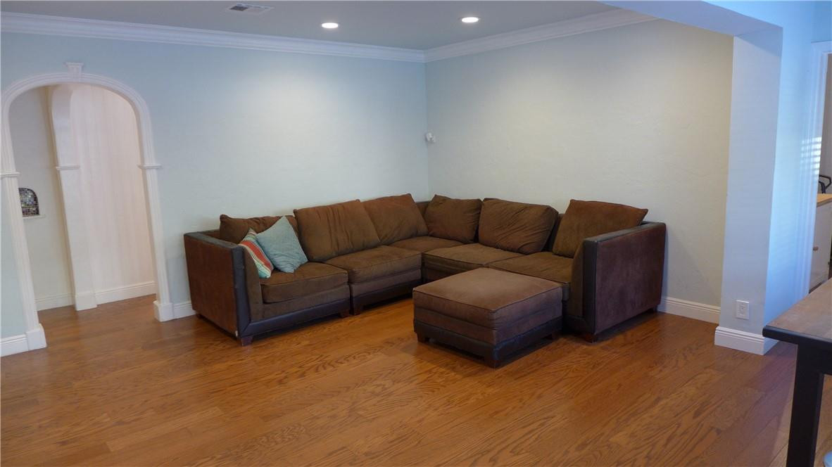 809 North Victoria Park Road Fort Lauderdale, FL 33304 - Photo 11 of 25 a living room with furniture and a wooden floor