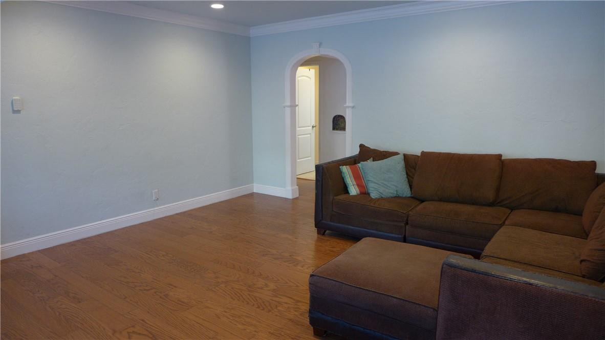 809 North Victoria Park Road Fort Lauderdale, FL 33304 - Photo 12 of 25 a living room with furniture and a window