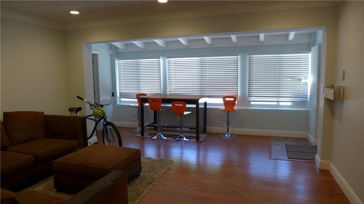809 North Victoria Park Road Fort Lauderdale, FL 33304 - Photo 13 of 25 a view of a livingroom with furniture and a window
