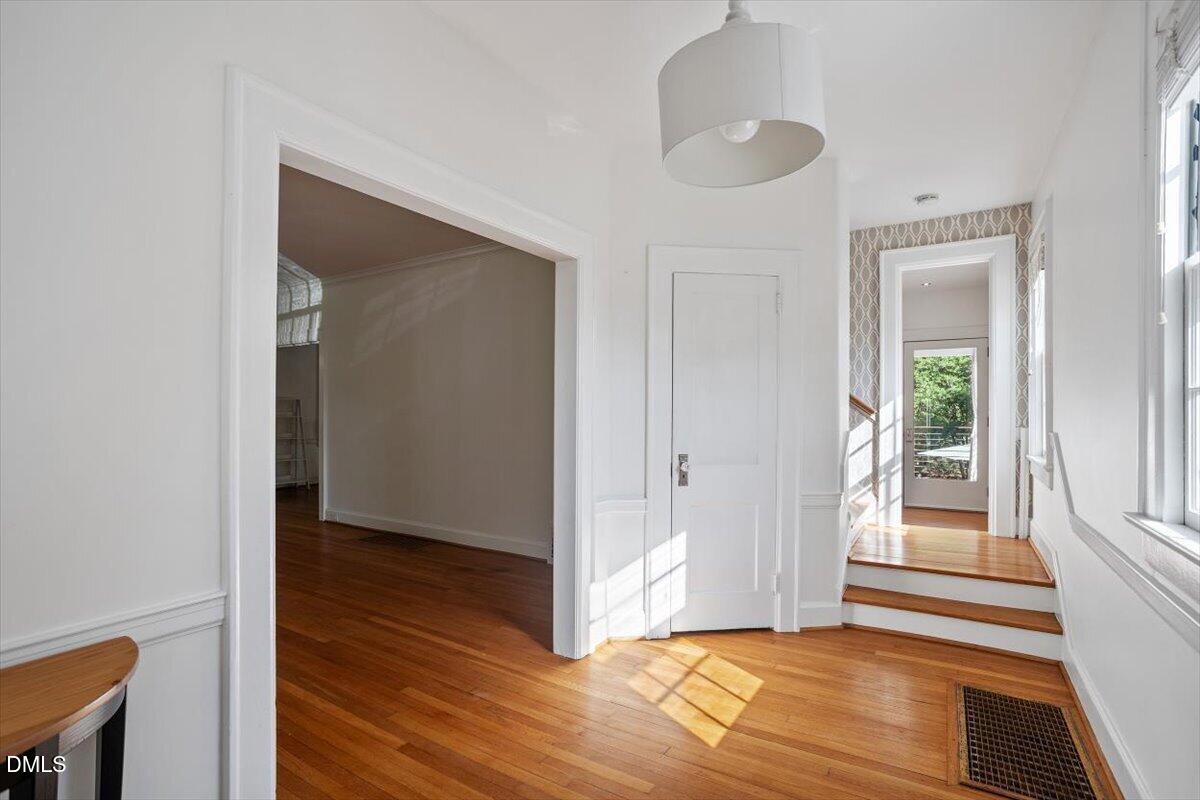 2201 Byrd Street Raleigh, NC 27608 - Photo 11 of 37 a view of entryway with wooden floor