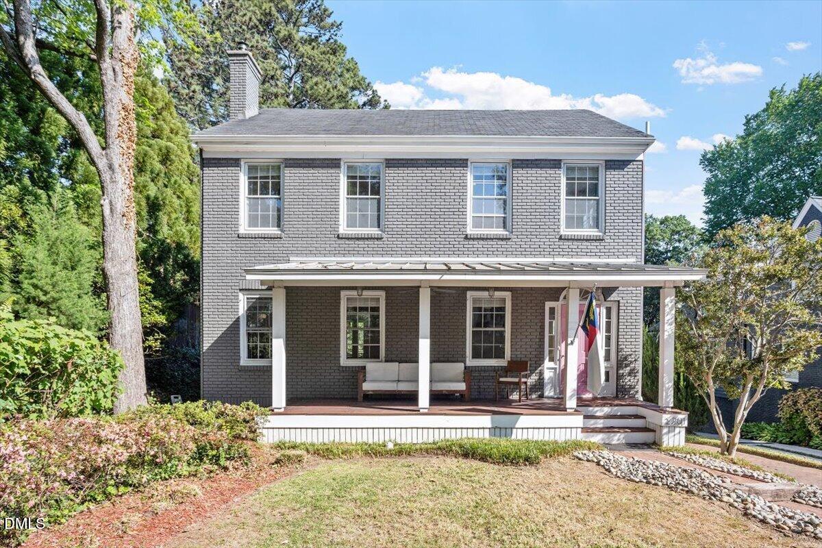 2201 Byrd Street Raleigh, NC 27608 - Photo 2 of 37 front view of a house with a yard