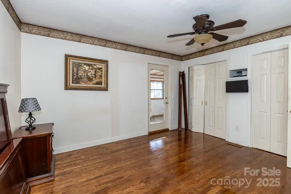 a view of a livingroom with a hardwood floor