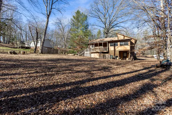 a view of house with outdoor seating