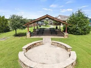 an aerial view of a house with outdoor space