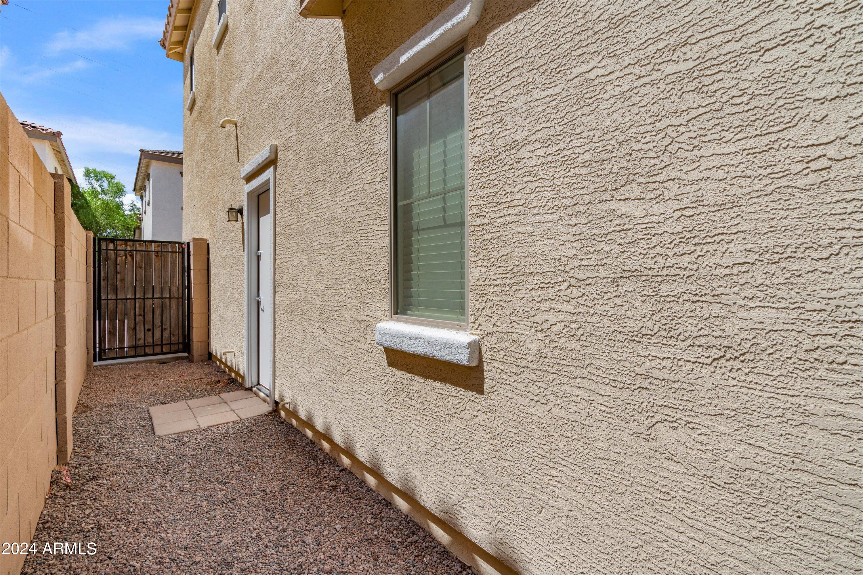 431 North Ranger Trail Gilbert, AZ 85234 - Photo 29 of 38 30-Garage Exit