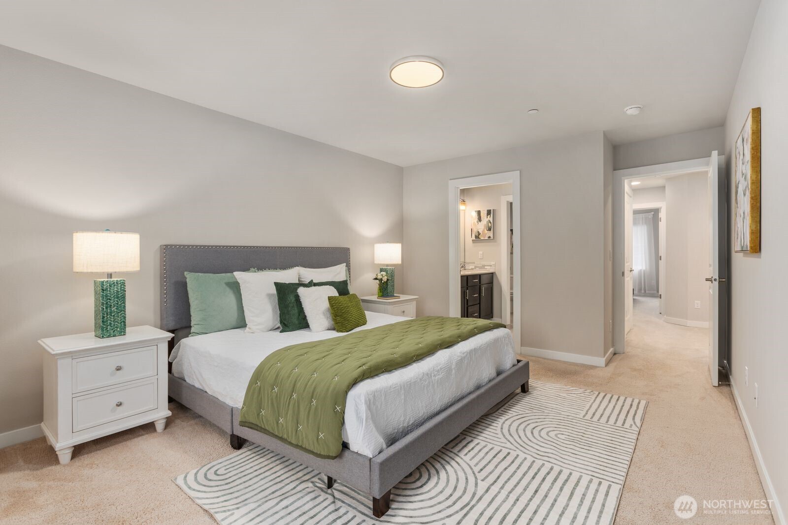 1621 Seattle Hill Road, Unit C4 Bothell, WA 98012 - Photo 19 of 35 a bedroom with a bed and a night stand