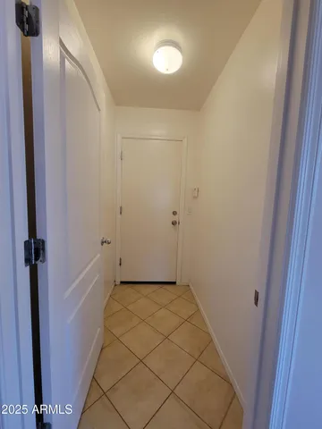 a view of an entryway with staircase