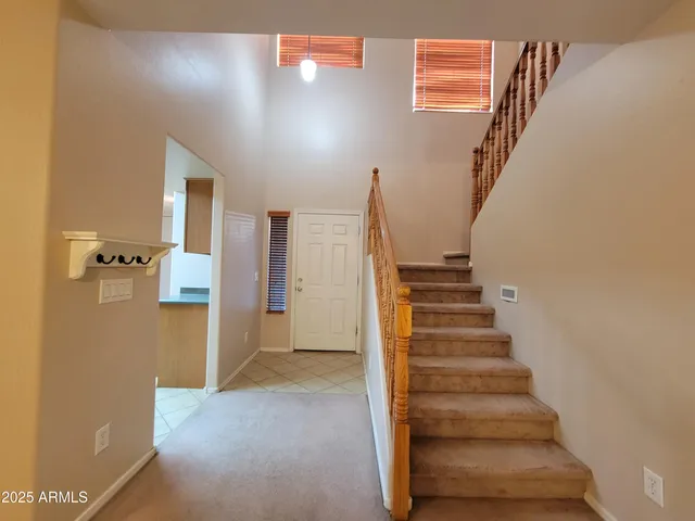 a room with furniture and wooden floor