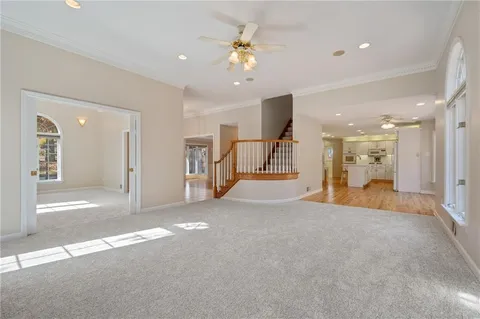 a view of a hallway with a chandelier