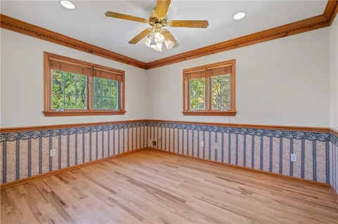 a view of entryway with wooden floor