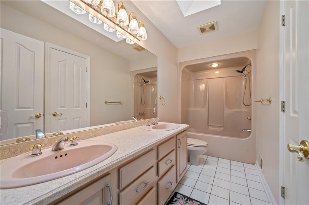 131 Hidden Valley Road Murrysville, PA 15668 - Photo 32 of 50 a bathroom with a sink a toilet and shower