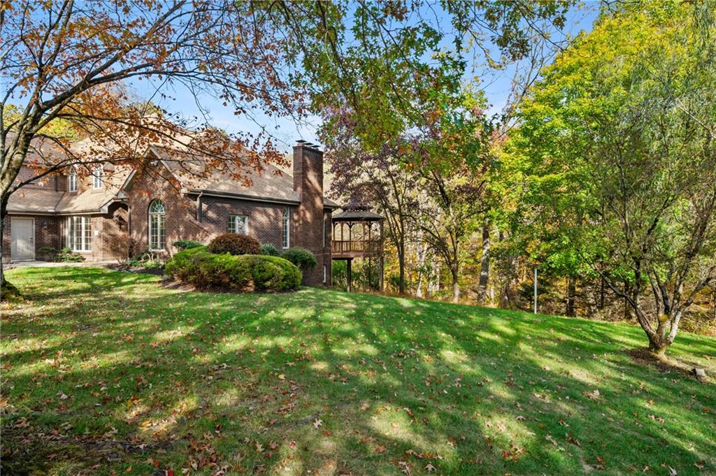 131 Hidden Valley Road Murrysville, PA 15668 - Photo 43 of 50 a view of a yard in front of a house