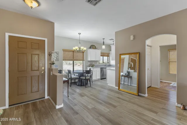 a view of a kitchen and dining room