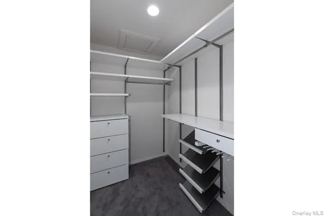 a room with cabinets and a stove