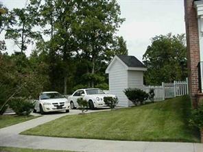 120 South Square Row Davidson, NC 28036 - Photo 2 of 8 a white house covered with tall trees