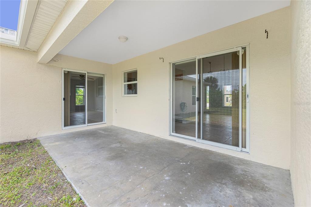 11708 Willmington Boulevard Port Charlotte, FL 33981 - Photo 34 of 41 a view of livingroom with an empty space