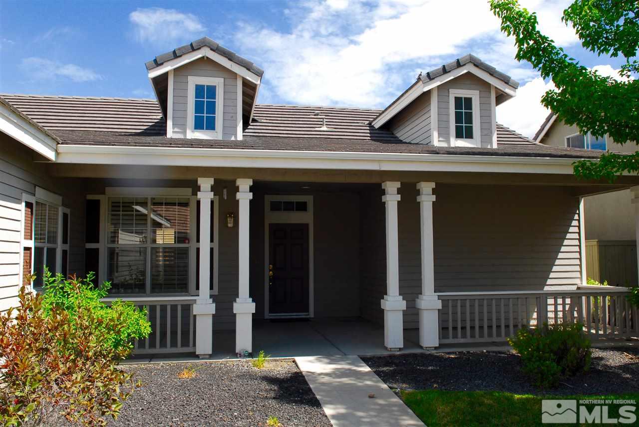 1437 Wild Wolf Way Reno, NV 89521 - Photo 1 of 20 front view of a house with a yard