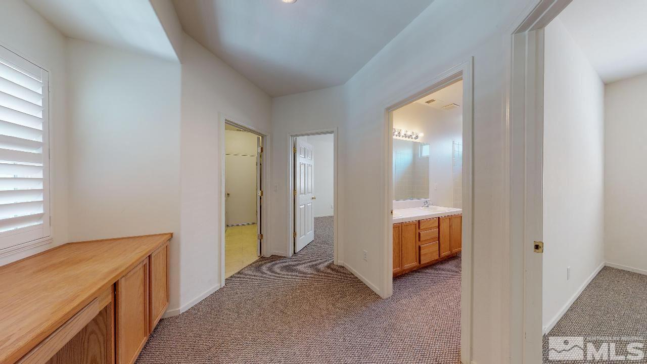 1437 Wild Wolf Way Reno, NV 89521 - Photo 12 of 20 a view of an empty room and window