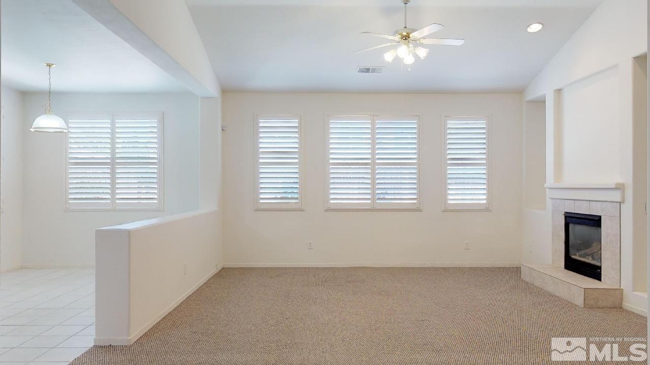 1437 Wild Wolf Way Reno, NV 89521 - Photo 3 of 20 a view of an empty room with a window