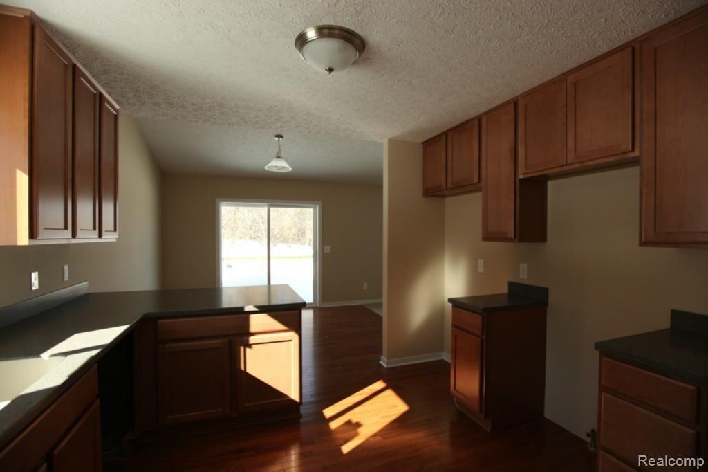 804 Spirea, Unit 98 Howell, MI 48843 - Photo 3 of 10 Previous ranch in the Meadows