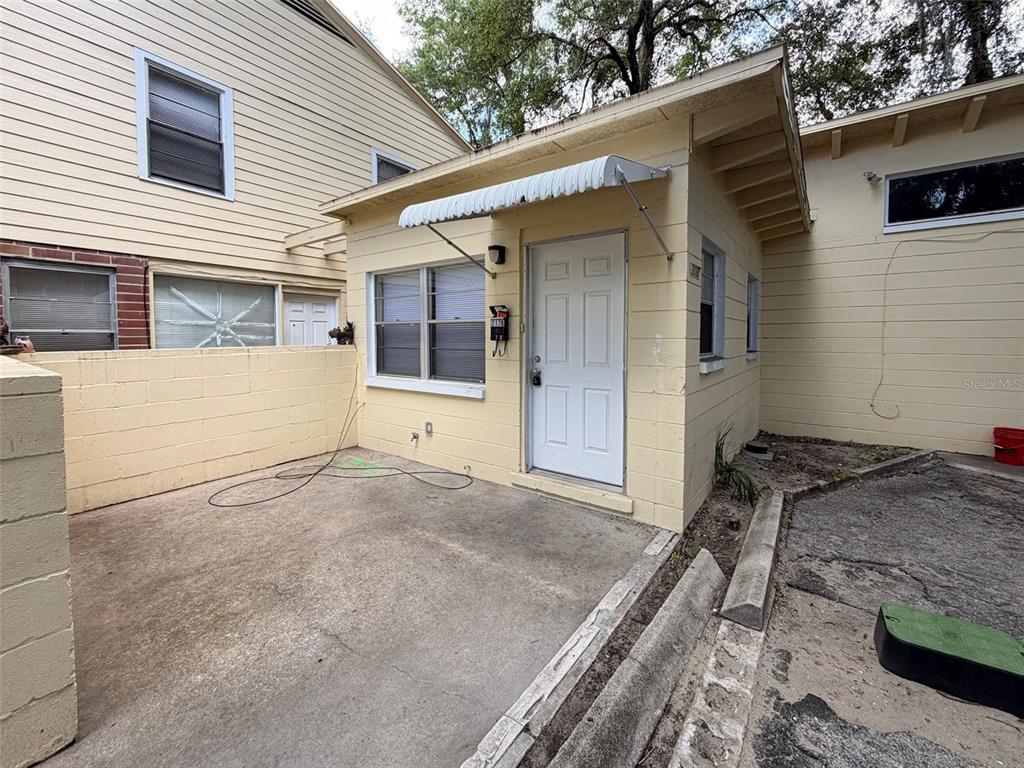 219 Northwest 3rd Avenue, Unit B Gainesville, FL 32601 - Photo 1 of 20 a view of backyard of the house