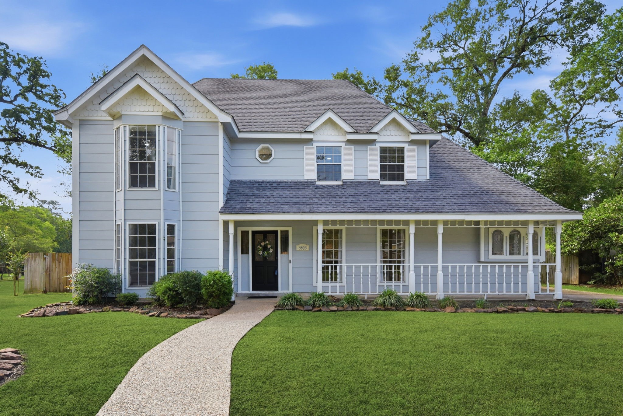 Striking Victorian-style architecture with timeless curb appeal, fresh exterior paint, and cement board siding—this home makes a memorable first impression from the moment you arrive.