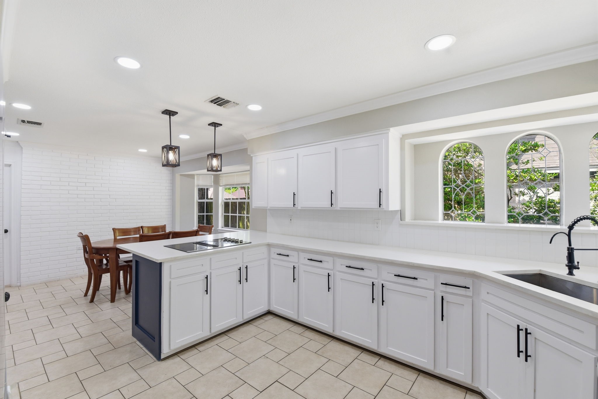 3603 Beech Hill Drive Spring, TX 77388 - Photo 19 of 44 The windows in the Kitchen allow natural light and they are beautiful and arched for even more architectural interest.