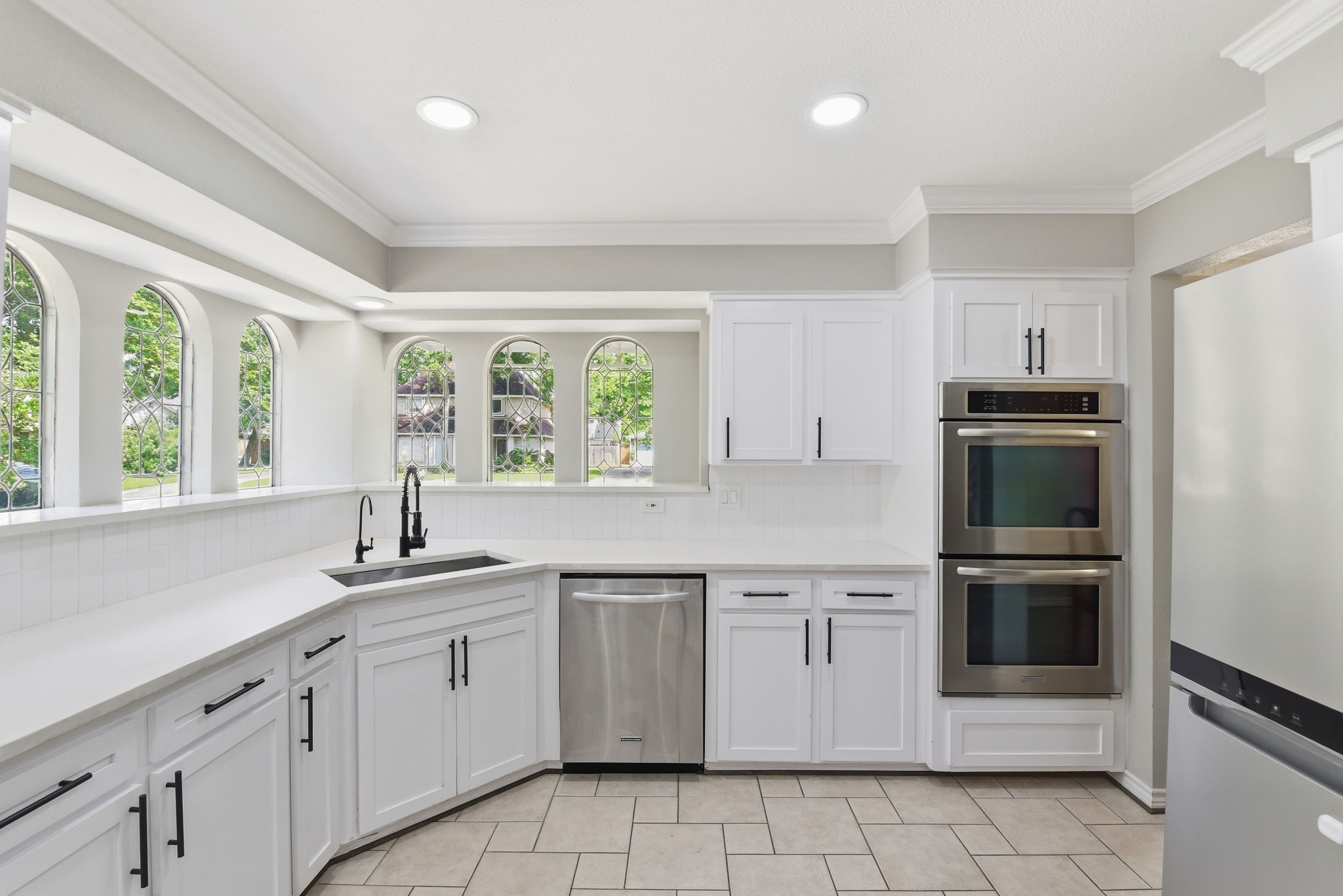 3603 Beech Hill Drive Spring, TX 77388 - Photo 20 of 44 The windows in the Kitchen allow natural light and they are beautiful and arched for even more architectural interest.
