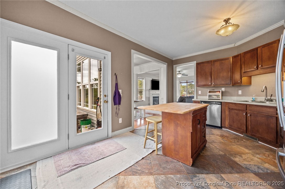 10 Braxton Court Erwin, NC 28339 - Photo 11 of 28 a living room with kitchen island furniture and a window