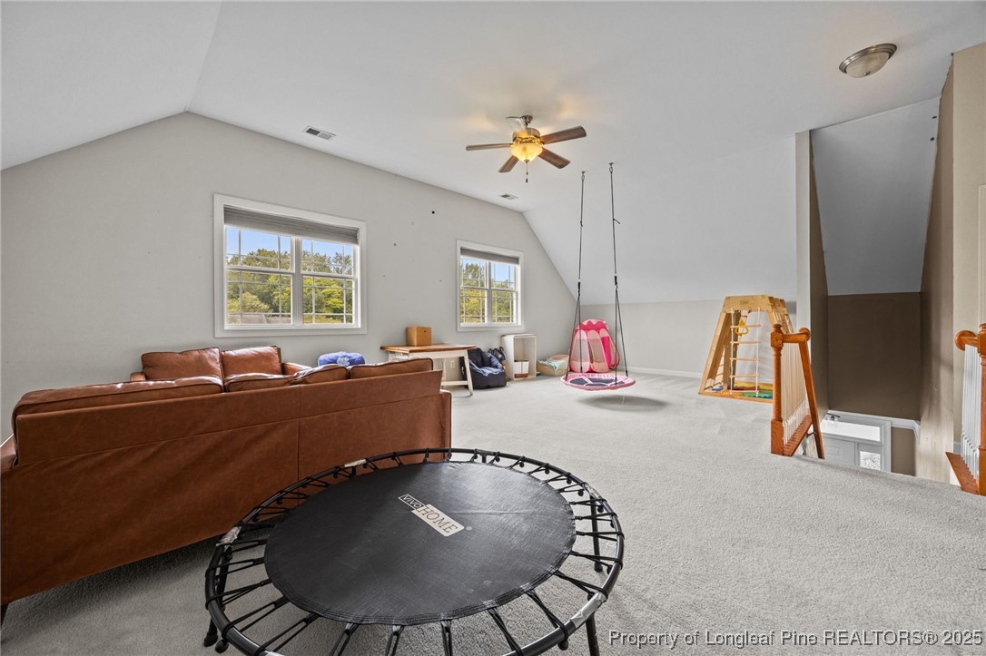 10 Braxton Court Erwin, NC 28339 - Photo 19 of 28 a living room with furniture and a flat screen tv