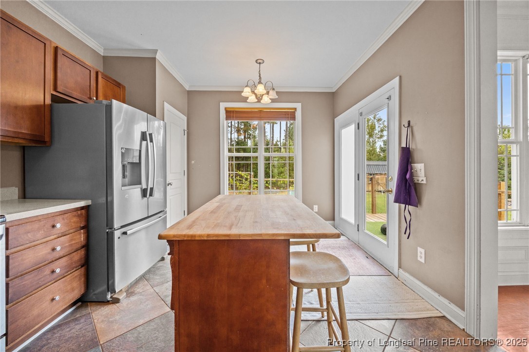 10 Braxton Court Erwin, NC 28339 - Photo 9 of 28 a kitchen with stainless steel appliances granite countertop a refrigerator and a stove top oven