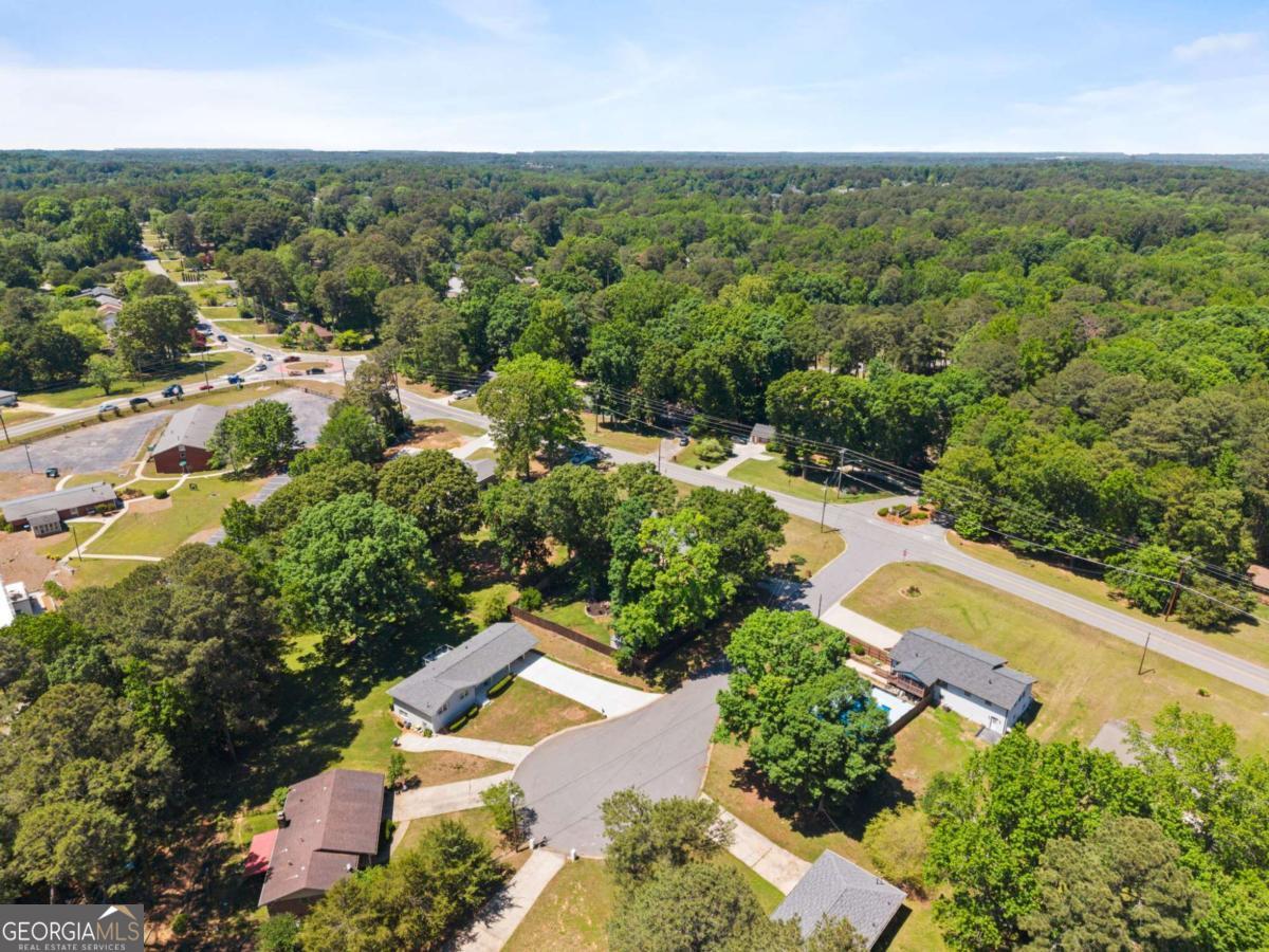 865 Old Tucker Road Stone Mountain, GA 30087 - Photo 54 of 57 an aerial view of a city with lots of residential buildings