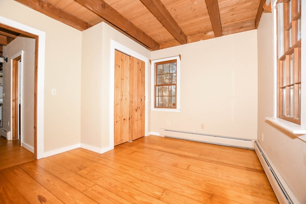 58 Alley Road Rochester, MA 02770 - Photo 20 of 29 a view of an empty room with a window