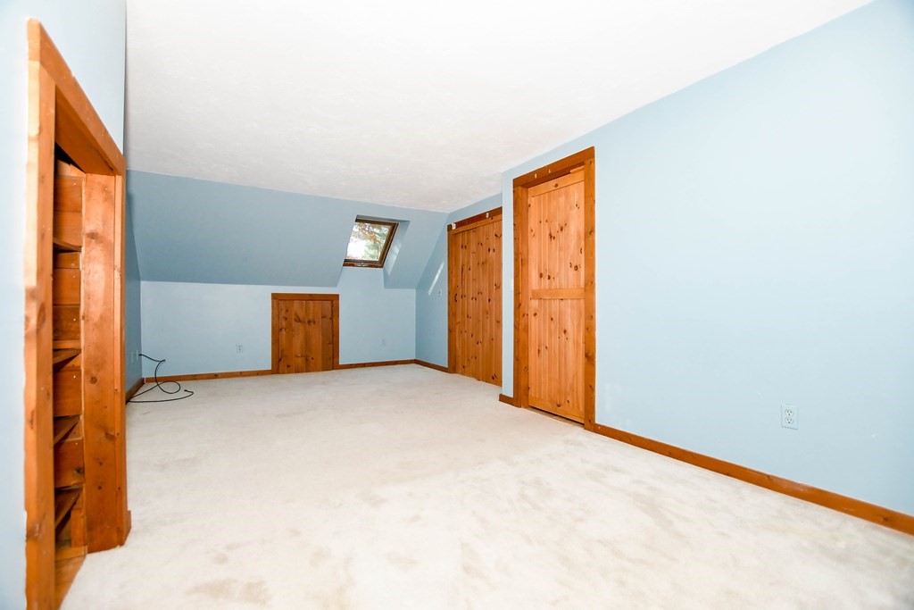 58 Alley Road Rochester, MA 02770 - Photo 25 of 29 a view of an empty room with a window