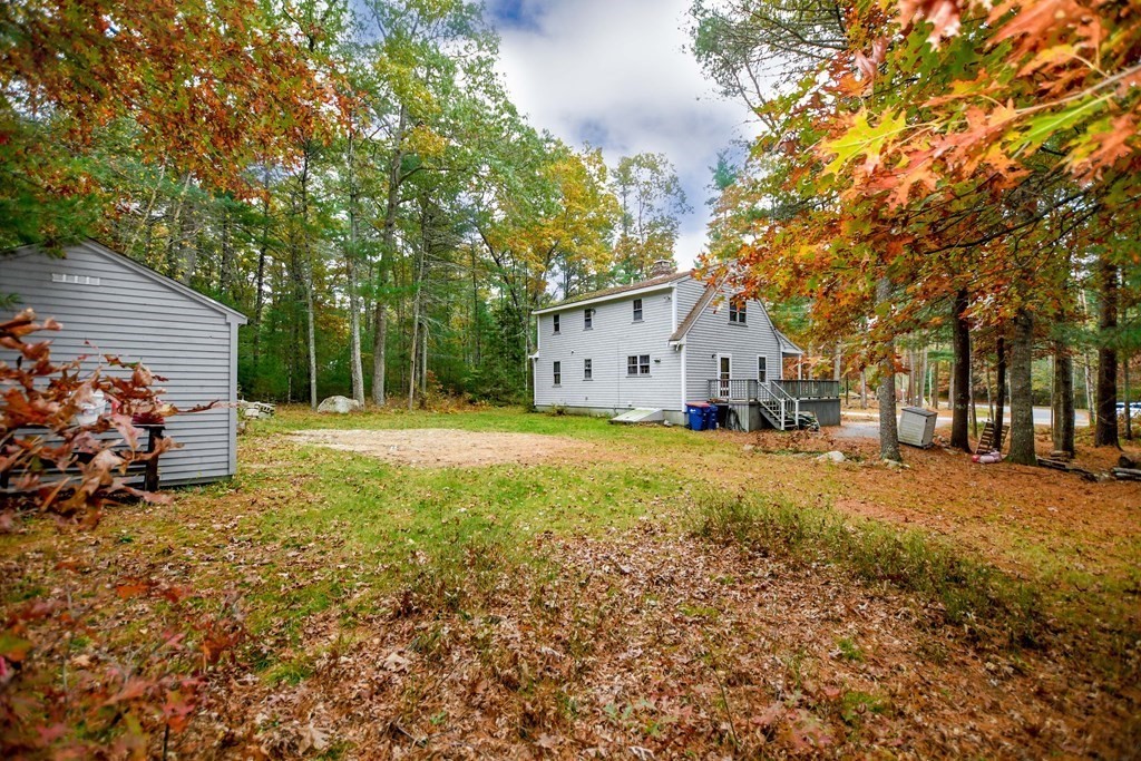 58 Alley Road Rochester, MA 02770 - Photo 4 of 29 a view of a house with a backyard