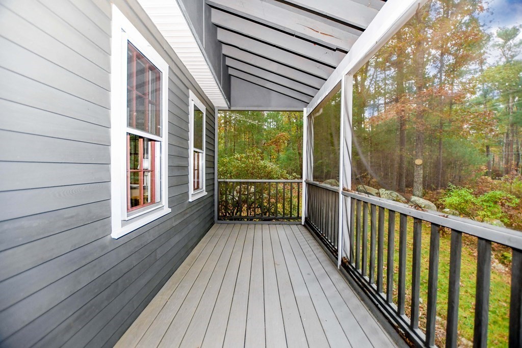 58 Alley Road Rochester, MA 02770 - Photo 7 of 29 a view of a balcony with wooden floor