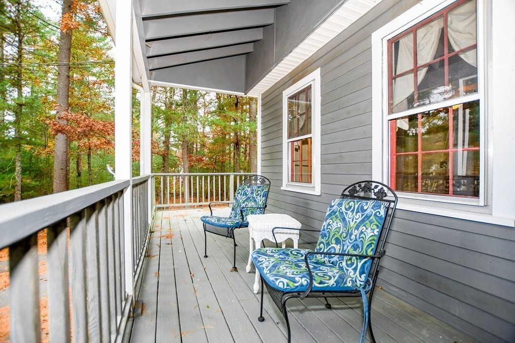 58 Alley Road Rochester, MA 02770 - Photo 8 of 29 a balcony with furniture and wooden floor