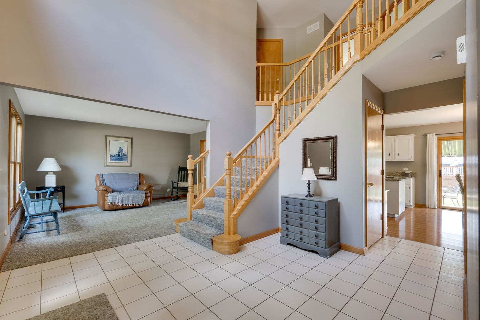 25114 Vermette Road Plainfield, IL 60585 - Photo 8 of 28 a view of a livingroom with furniture and stairs