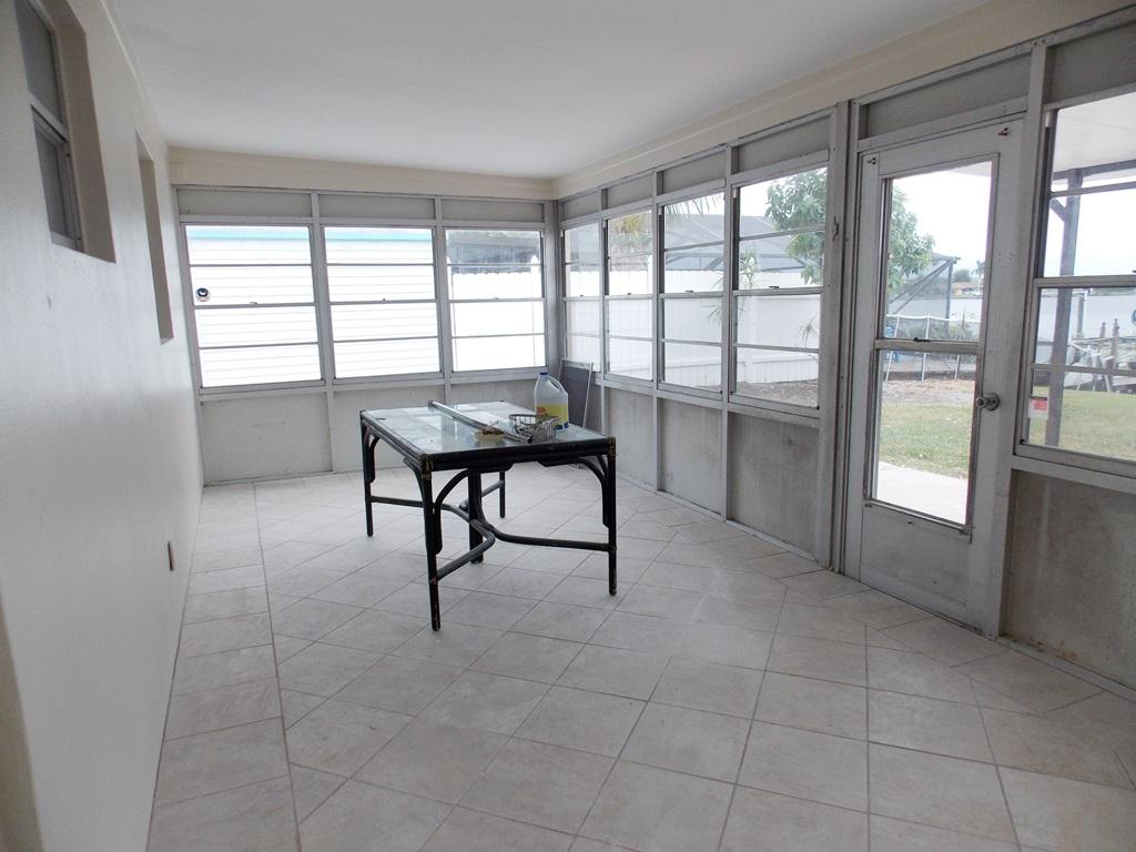 100 Southwest Hideaway Place Stuart, FL 34994 - Photo 17 of 23 a room with furniture and a window