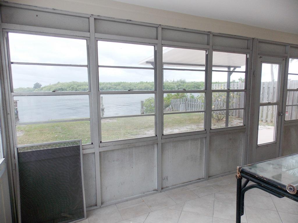 100 Southwest Hideaway Place Stuart, FL 34994 - Photo 18 of 23 a view of an empty room and window