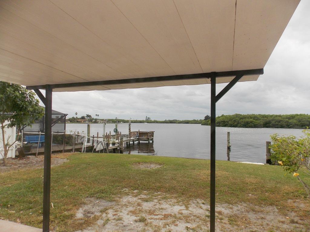 100 Southwest Hideaway Place Stuart, FL 34994 - Photo 19 of 23 a view of ocean from a balcony