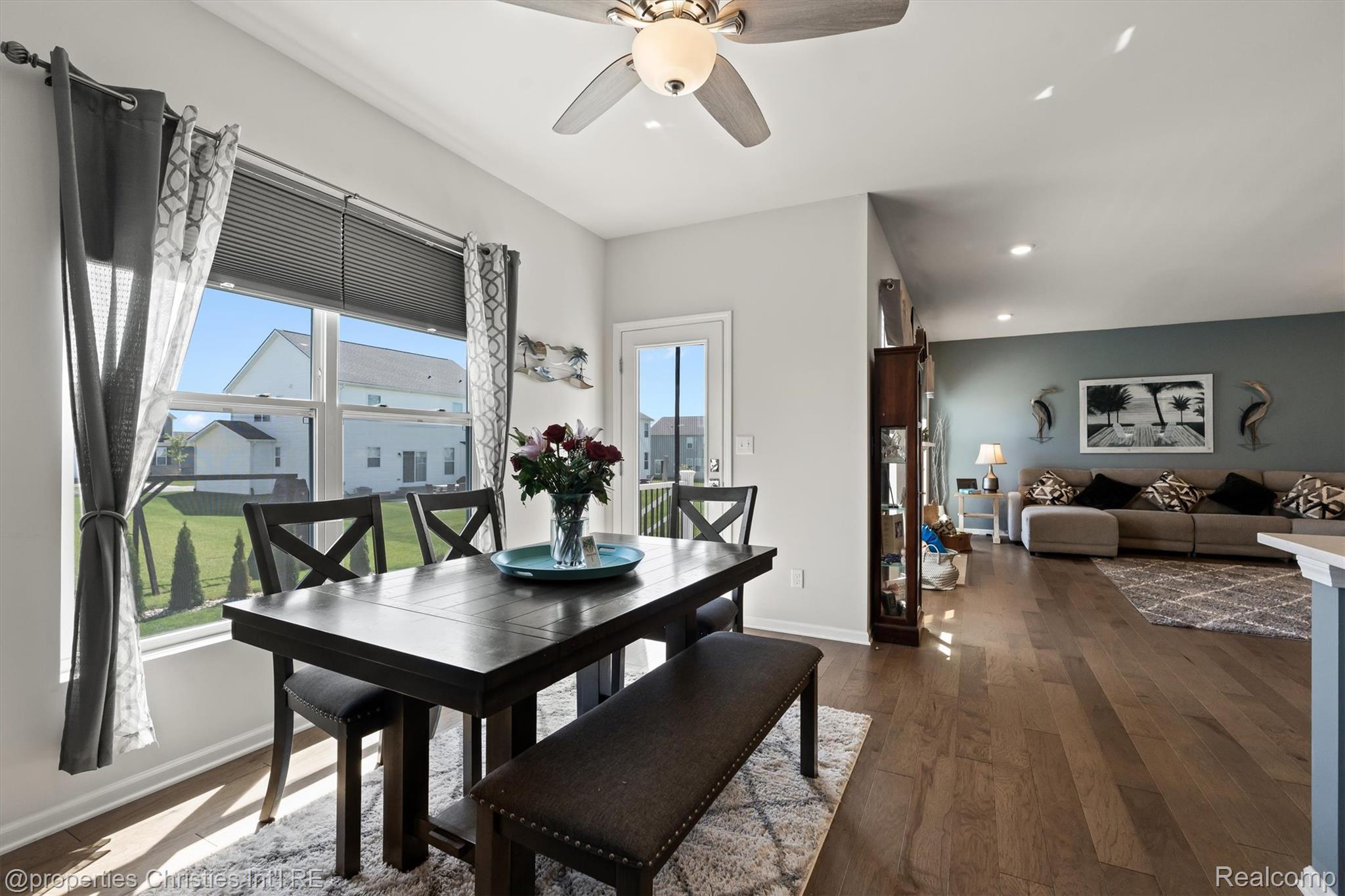 2721 Maize Loop Saline, MI 48176 - Photo 13 of 52 Dining area featuring dark wood-style floors, a ceiling fan, and recessed lighting