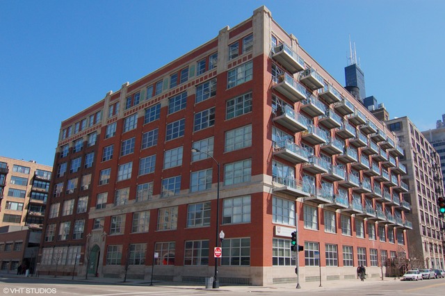 333 South Desplaines Street, Unit 605 Chicago, IL 60661 - Photo 1 of 8 a front view of a building