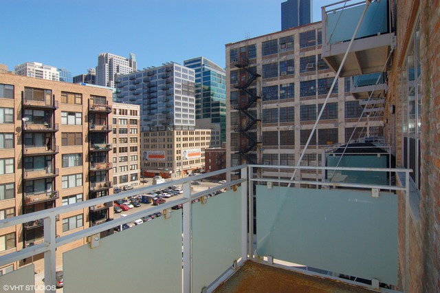 333 South Desplaines Street, Unit 605 Chicago, IL 60661 - Photo 8 of 8 a view of a building with glass windows
