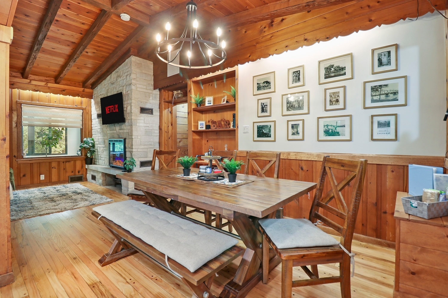 2618 Apache Trail McHenry, IL 60051 - Photo 11 of 34 a view of a dining room with furniture a chandelier and wooden floor