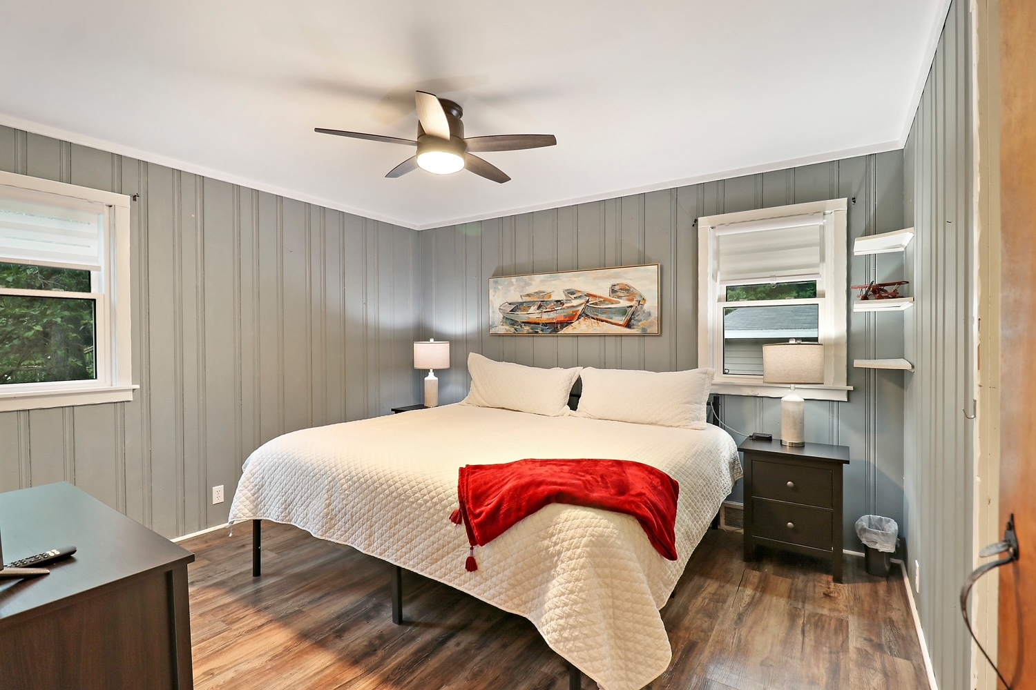 2618 Apache Trail McHenry, IL 60051 - Photo 17 of 34 a bedroom with a bed and wooden floor