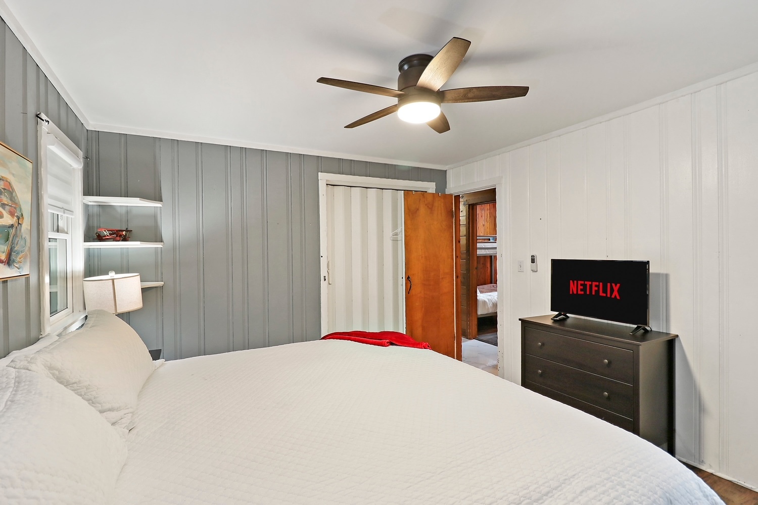 2618 Apache Trail McHenry, IL 60051 - Photo 18 of 34 a bedroom with a bed and a flat screen tv